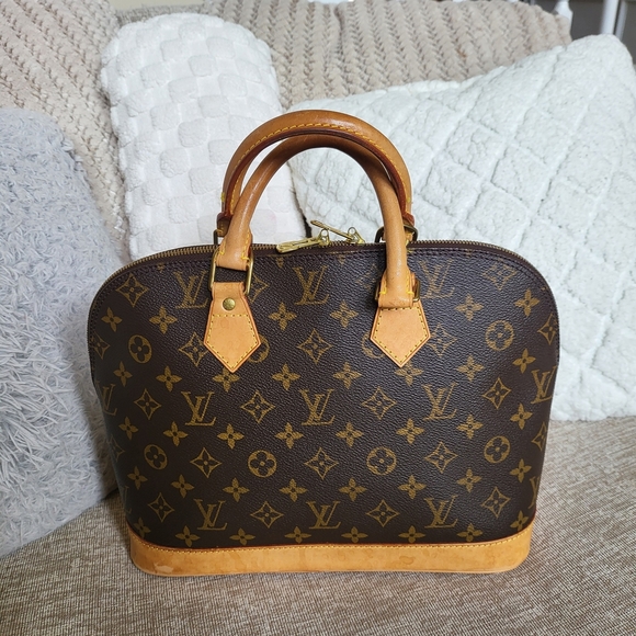 Louis Vuitton Handbags - Authentic Louis Vuitton Monogram Alma PM Hand Bag..